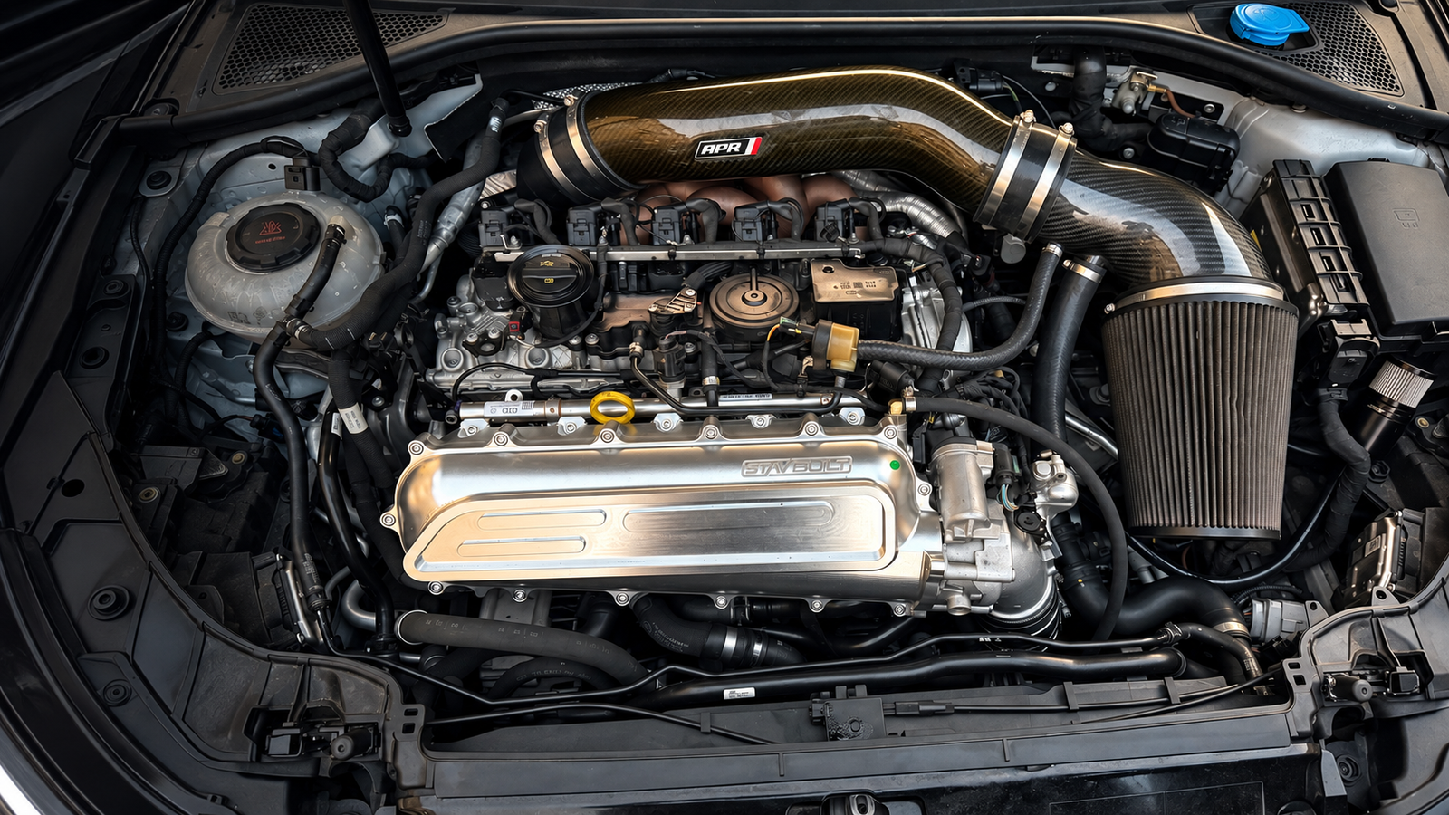 Audi performance engine bay with carbon-fiber APR intake